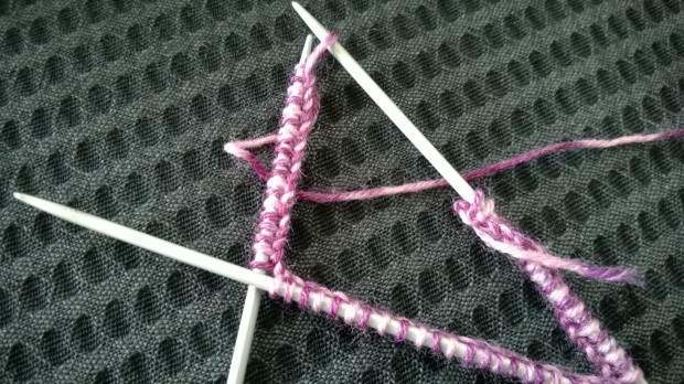 Cast-on stitches separated onto 3 needles.